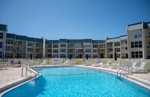 Crescent Beach Apartment | Beachfront Escape with Pool Ocean & coastal Views