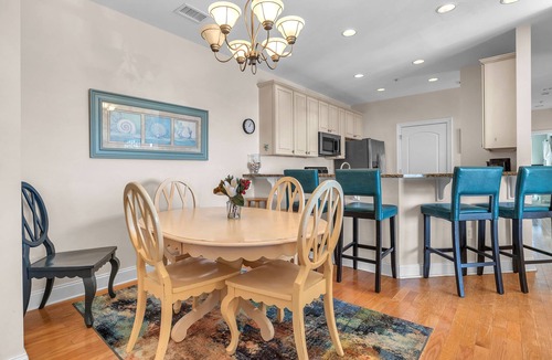 Yaupon Beach Condo | Beats Working: Condo with Community Pool Near OKI Pier and Restaurants