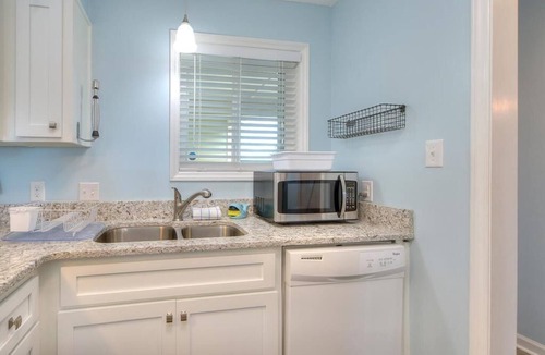 Caswell Beach Condo | Beautiful 2BR/2BA Oceanfront Condo-Beach Steps Away, Pool, Sleeps 5