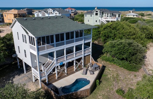 Carova Beach House | Beautiful Carova beach house with ocean view, pool and hot tub! Pet Friendly!