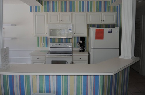 Calabash Villa | Beautiful Ground Floor Two Bedroom Condo just steps from the Pool!