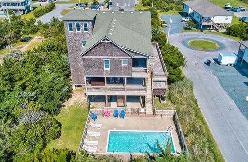 Waves House | Beautiful Home with pool, hot tub, AC, W/D, & fireplace