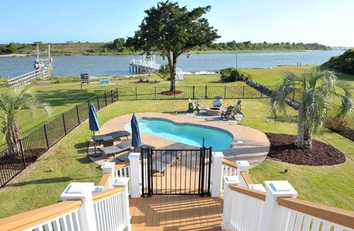 Shallotte House | Beautiful ICW views! Private pier, pool, hot tub, fire pits, and more!