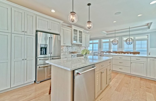 Ocean Isle Beach House | Beautiful new Custom Oceanfront home with XL covered decks, pool and elevator.