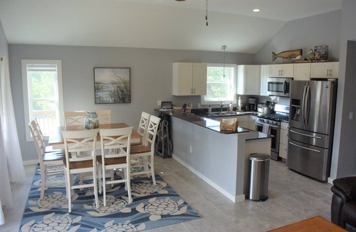 Carova Beach House | Beautiful Secluded Carova Beach House - Hot tub - Pet yard with access door