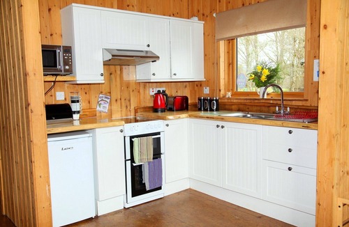 Dallavich Cabin | BRACKEN is a beautiful log cabin with lovely outlook over open meadow.