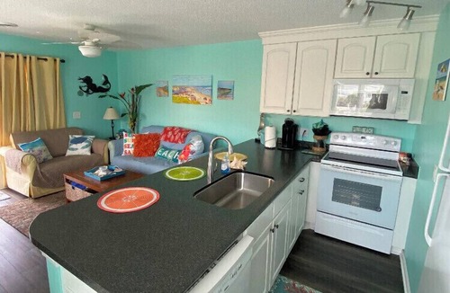 North Carolina Coast Condo | Bright end unit, Ocean Views, 1st floor, Pool, Double Decks, Keyless Entry