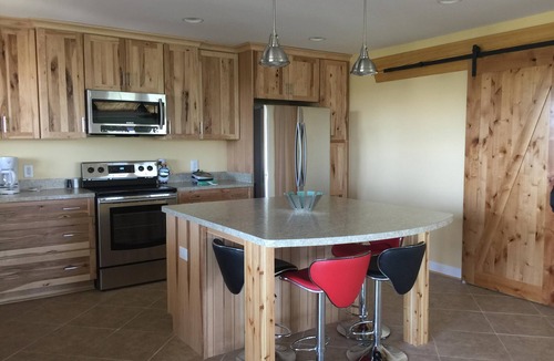 Carova Beach House | Canal front. 4WD area. Hot tub. Screened-in porch. Large deck. Game room.