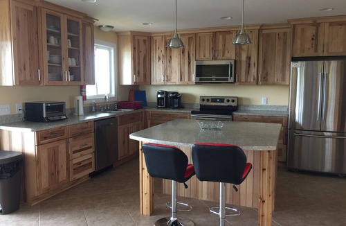 Carova Beach House | Canal front. 4WD area. Hot tub. Screened-in porch. Large deck. Game room.