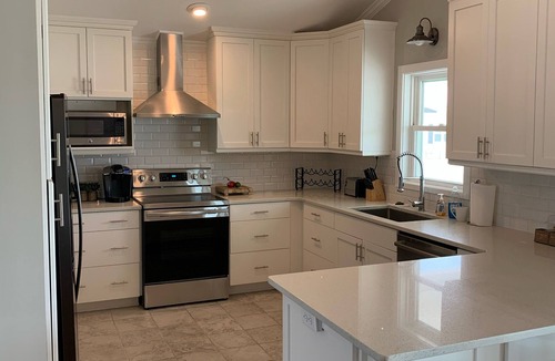 Ocean Isle Beach House | Canal/w dock, pool, ocean view, 1 block from beach & EV charger
