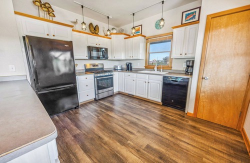 Avon House | Canalfront Home in Avon with Hot Tub, Private Boat Dock, Kayaks, and Game Room