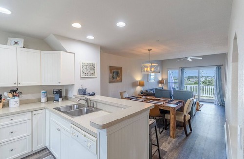 Bermuda Bay House | Centrally located townhome w/a resort-style community pool & gorgeous sunsets!