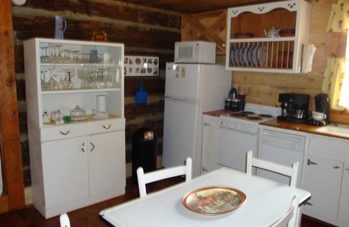 Pittsboro House | Century old log cabin on 62 acre estate