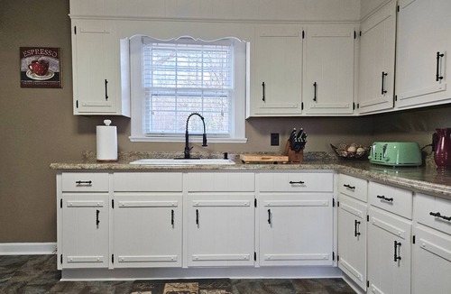 Olivia House | Charming 4-bedroom historic estate with beautiful pond views in Sanford