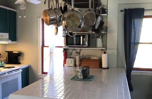 Southern Shores House | Charming, unique beach bungalow nestled in woodsy dunes. Walk to private beach.