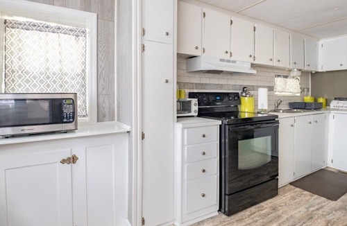 Denton House | Cheerful Wooded Retreat: 2BD/1BA | Denton