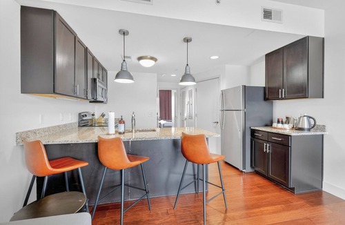 12 South Apartment | Chic Boutique Condo in Nashvilles coveted 12 South Neighborhood Coffee Shops, Restaurants, Bars and Boutiques, just steps away. Featuring a King bed plush linens , bath products and a balcony with free parking!