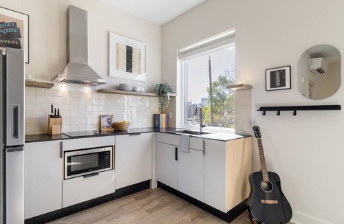 Buena Vista Apartment | Chic King Studio + Record Player | Germantown | Conway by AvantStay