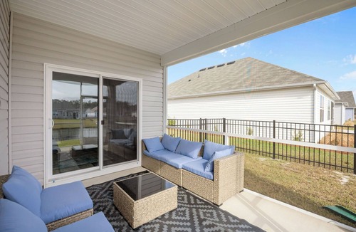 Supply House | Coastal Family Getaway Near Holden Beach with water views, covered patio & games