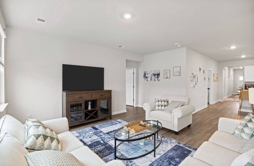 Supply House | Coastal Family Getaway Near Holden Beach with water views, covered patio & games