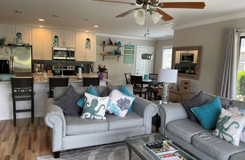Sea Trail Condo | Coastal Retreat with Lake and Golf Course Views!