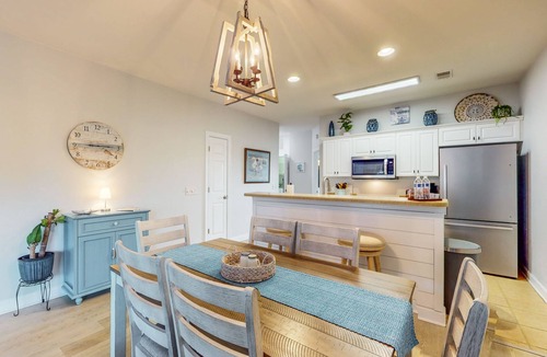 Sea Trail Condo | Coastal Villa with golf course view and shared pool access
