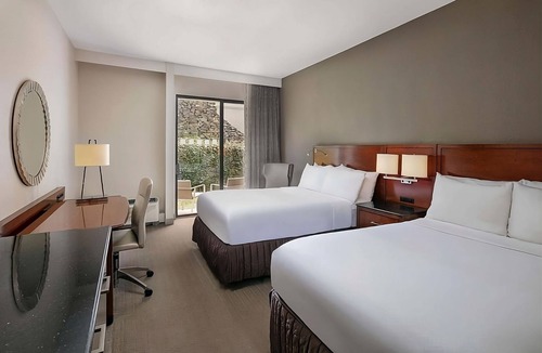 Executive Park Hotel | Comfort and Convenience! 3 Convenient Units, Pet-Friendly, Parking, Pools!