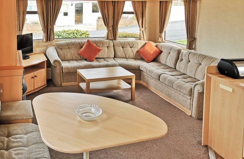 Ludchurch House | Comfortable and spacious 12ft-wide caravan with one double and one twin.