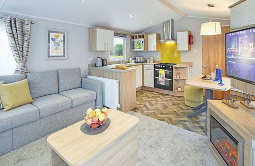 Strathblane House | Comfortable, modern two-bedroom caravan sleeping four people.