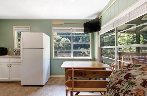 Sylva Cottage | Cottage on the Tuckasegee River with firepit, picnic area, hot tub, & AC