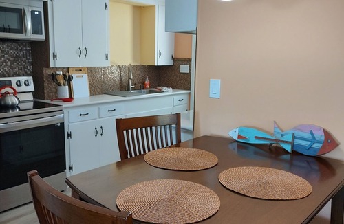 Supply Cottage | Cozy Cottage one mile from the Beach and Boat Ramp! Pet Friendly Too!