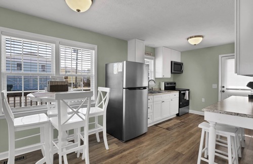 Surf City Cottage | Cozy Cottage steps from the beach small pet friendly