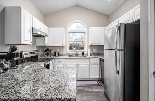 Cary House | Cozy Industrial Kildaire Farms Home- near Downtown