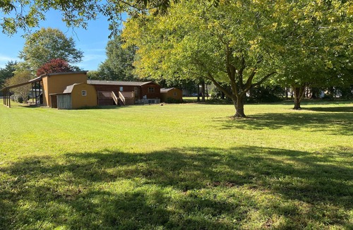 Lowesville House | Cozy log cabin, centrally located with covered storage for an RV/Boat