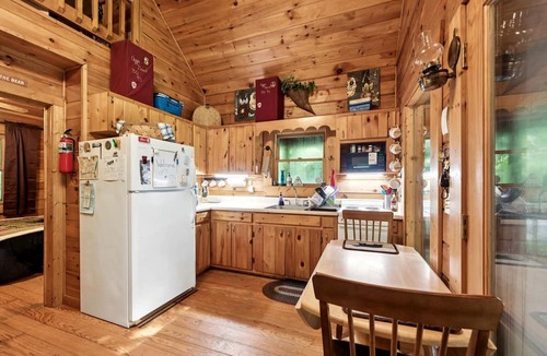 Andrews Boat Rental | Cozy Log Cabin Hideaway on Collett Creek with Loft and Porch in Andrews NC