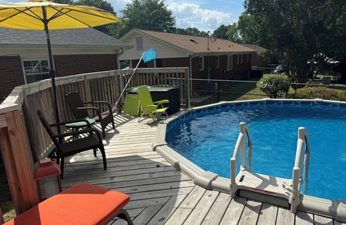 Oak Forest House | Cozy Ranch Style home with sun porch, above ground pool with fenced yard