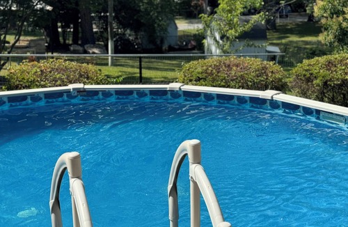 Oak Forest House | Cozy Ranch Style home with sun porch, above ground pool with fenced yard