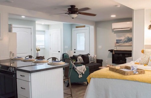 Harkers Island Resort | Cozy waterfront retreat with lighthouse view.