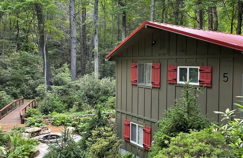 Cashiers House | Creek side cottage with fire pit. Walk to Cashiers. Dog friendly.