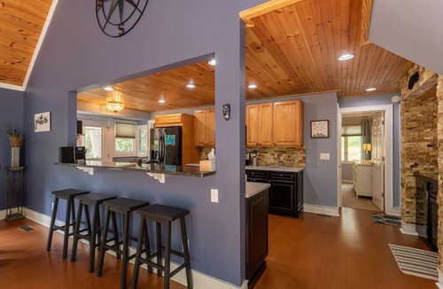Newland House | Creekside Cabin in Linville with seasonal views of lake, golf access and large deck with hot tub!