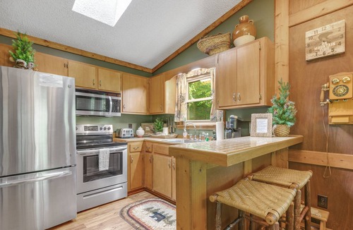 Sylva House | Creekside getaway with full kitchen, furnished deck, & gas grill