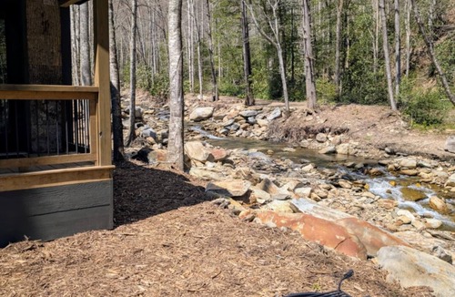 Old Fort Cabin | Dense foliage, rolling currents of Newberry Creek the perfect place to relax.