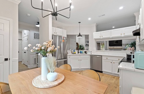 Southwest Raleigh Condo | Designer-Furnished 2BR Near NC State & Lake Johnson — Built for Longer Stays