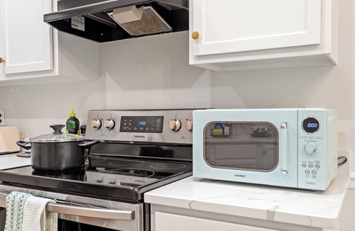 Southwest Raleigh Condo | Designer-Furnished 2BR Near NC State & Lake Johnson — Built for Longer Stays