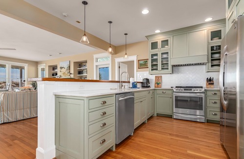 Flora's Bluff House | Discover your dream beach house with an amazing ocean view and lots of deck space on South Beach!