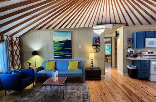 Mill Spring House | Dog friendly 30' Yurt, large dome skylight, king bed, 2 bedrooms, sleeps 6.