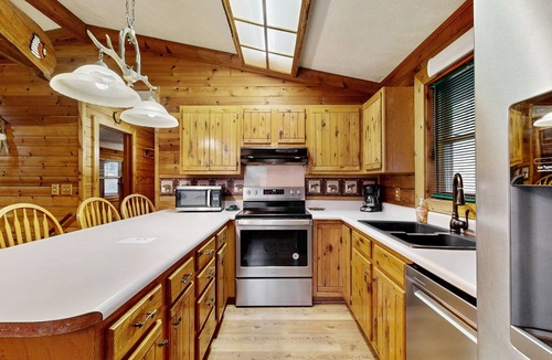 Sylva Cabin | Dog-friendly Log Cabin w/Private Deck, Firepit, Foosball, Wood-Burning Fireplace