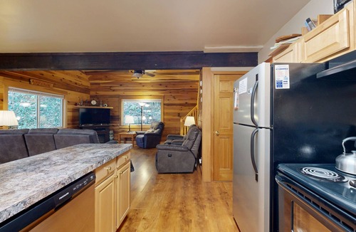 Whittier Cabin | Dog-friendly Smoky Mountain cabin with fireplace, charming deck & game loft