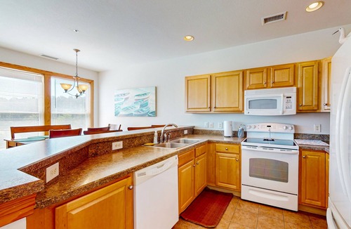 Bermuda Bay House | Dog-friendly water-view home with pool, balcony - beach access is 1.5 miles away