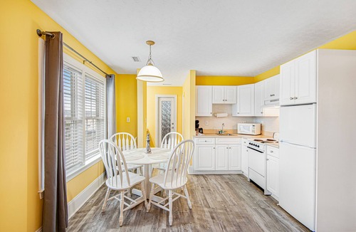 Surf City House | Dreamy ocean-view suite with pool, central AC, full kitchen, patio, & balcony